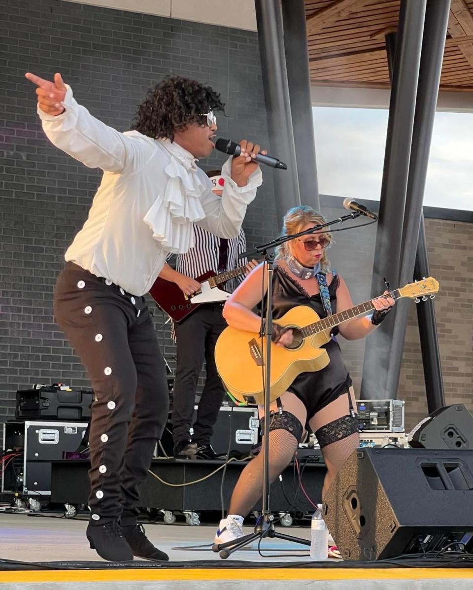 Shane Golden, of The Prince Project, sings a classic Prince song during the tribute band's concert on Saturday night at the Jackson Amphitheater.