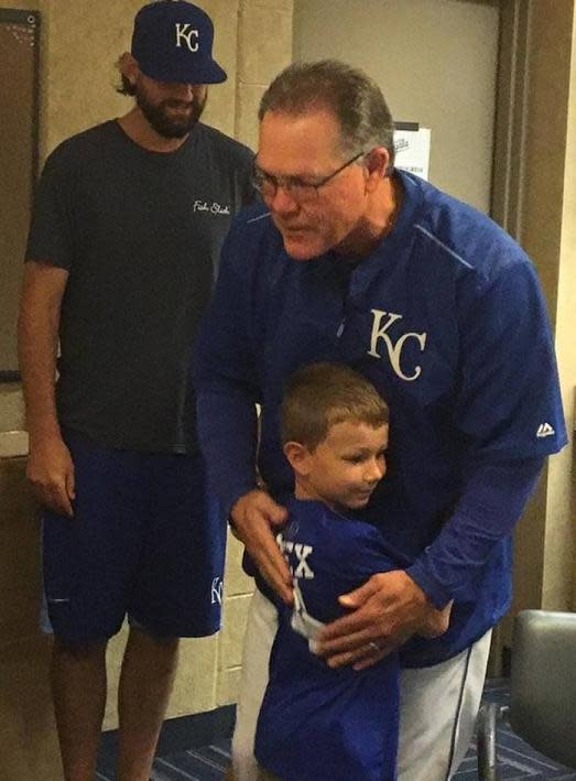 Alex Schwab gets a hug from Royals manager Ned Yost. (Kansas City Star)