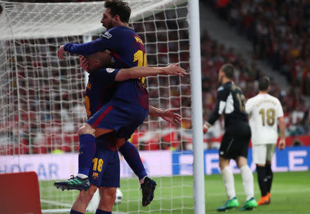 Soccer Football - Spanish King's Cup Final - FC Barcelona v Sevilla - Wanda Metropolitano, Madrid, Spain - April 21, 2018 Barcelona's Lionel Messi celebrates scoring their second goal with Jordi Alba REUTERS/Susana Vera