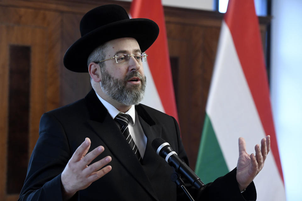 Ashkenazi Chief Rabbi of Israel David Lau delivers his speech during a signing ceremony of a comprehensive agreement between Deputy prime minister in charge of Hungarian communities abroad, church policy and national and ethnic minorities, Zsolt Semjen and Chief Rabbi of the Unified Israelite Congregation of Hungary (EMIH) Slomo Koves the Castle District premises of the Prime Minister's Office, in Budapest, Hungary, Monday, Nov. 18, 2019. By signing the agreement, the Hungarian state acknowledges the historical traditions of the Jewish community and "EMIH's service to the renaissance of Hungary's Jewish community", Semjen said at the signing ceremony.