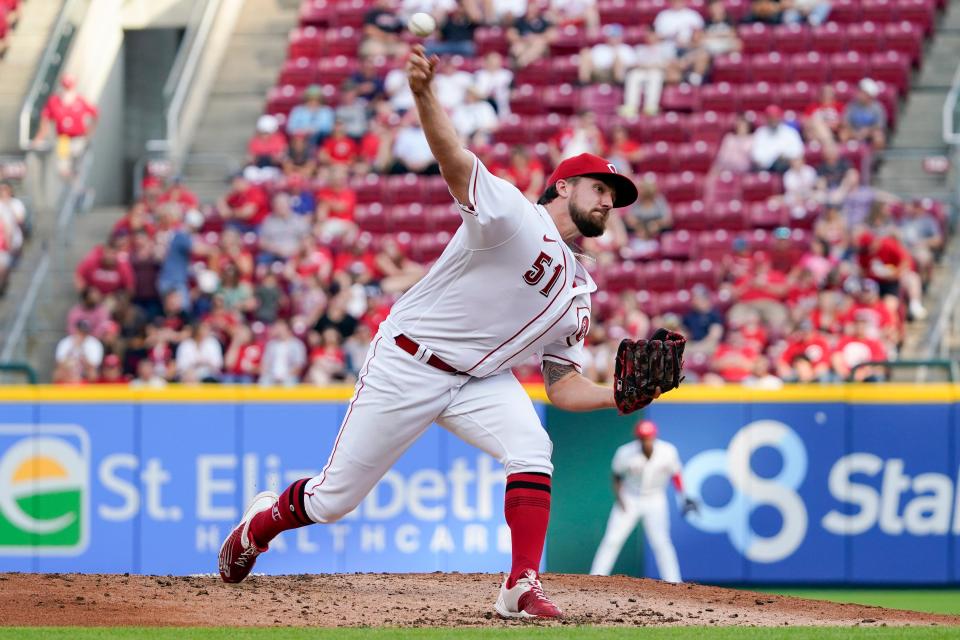 Cincinnati Reds starting pitcher Graham Ashcraft throws during the second inning of the team's baseball game against the Arizona Diamondbacks on Tuesday, June 7, 2022, in Cincinnati. (AP Photo/Jeff Dean)