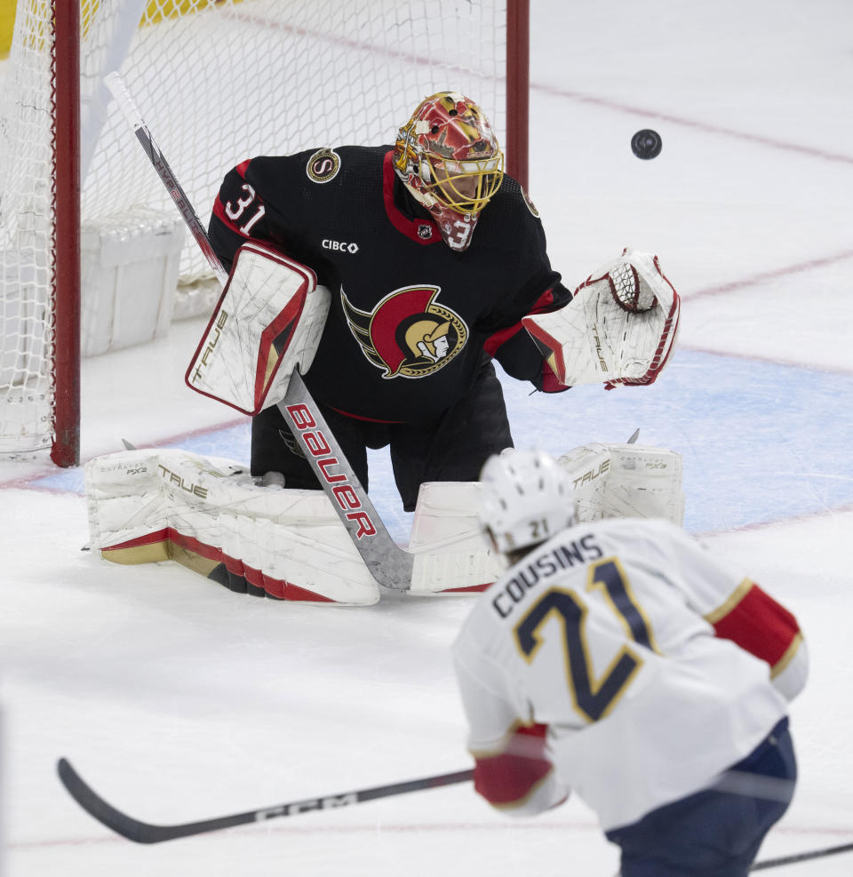 Florida Panthers center Nick Cousins fires the puck wide of the net past Ottawa Senators goaltender Anton Forsberg during the second period of an NHL hockey game Thursday, April 4, 2024, in Ottawa, Ontario. (Adrian Wyld/The Canadian Press via AP)