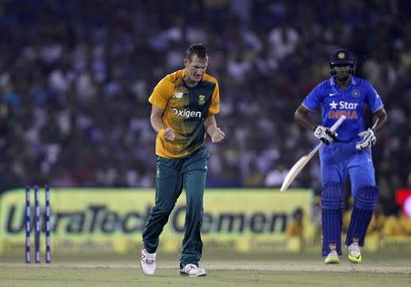 South African's Chris Morris celebrates after dismissing India's Ravichandran Ashwin during their second Twenty20 cricket match in Cuttack, India, October 5, 2015. REUTERS/Danish Siddiqui