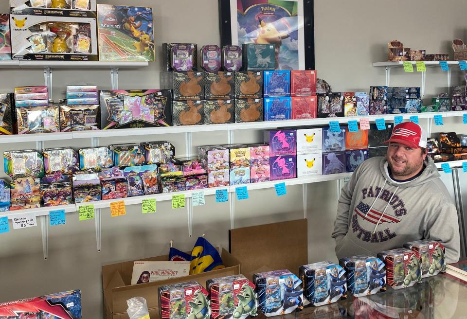 Kenny Long, owner of New Wave Hobbies in Dickson, inside his store filled with collectibles, video games and more.