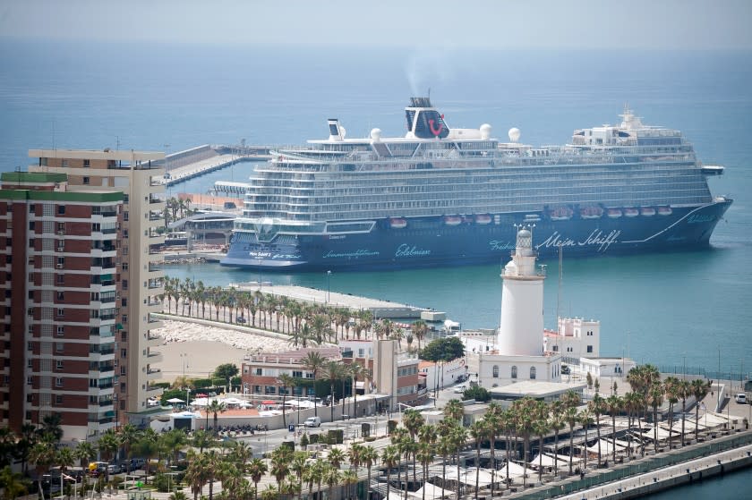 MALAGA, SPAIN - 2021/06/15: View of the cruise ship seen from Gibralfaro viewpoint, docked at the port.