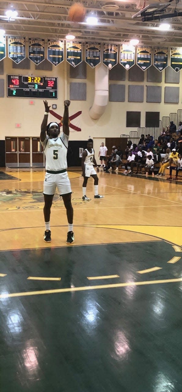 Suncoast forward Nate Sasser, who led all scorers with 26 points, shoots a free throw against Stranahan on Friday night.