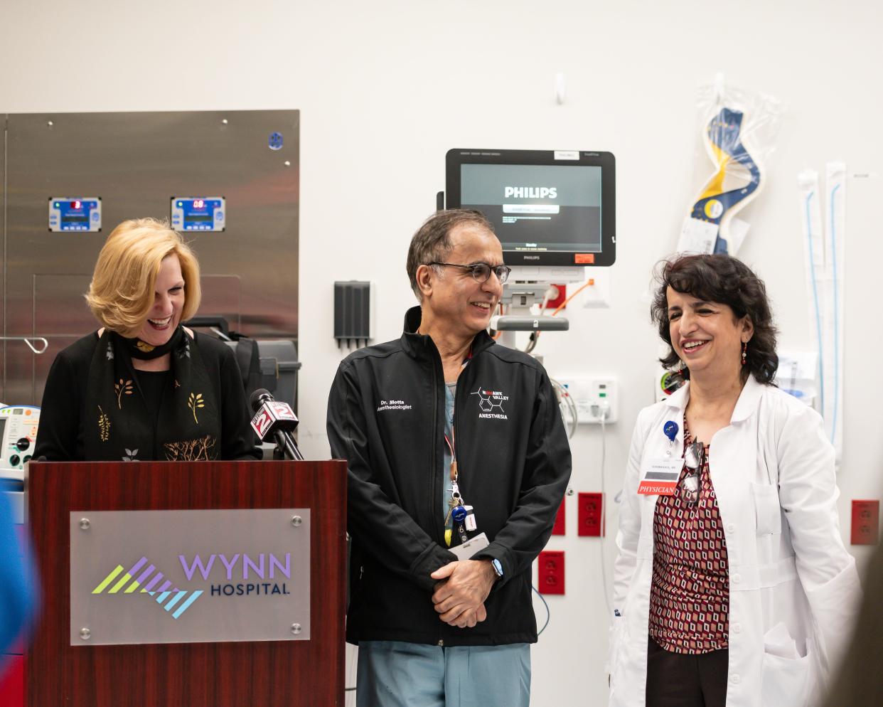 From left: President and CEO of MVHS Darlene Stromstad, Sunil Motta, and Sushma Kaul stand in an operating room inside the Wynn Hospital in Utica, NY on Wednesday, April 24, 2024.