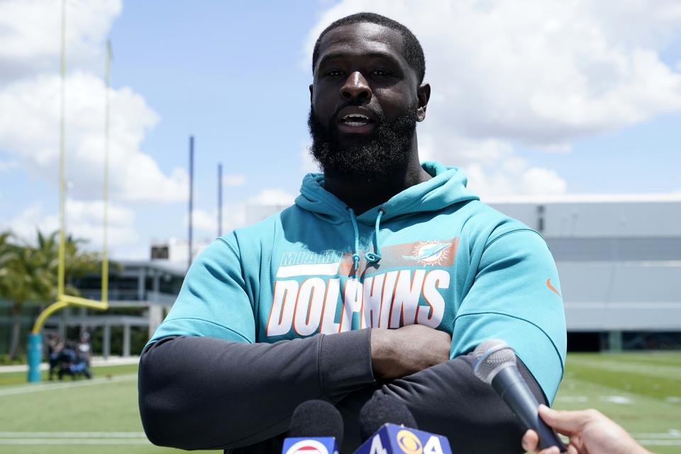 Miami Dolphins tackle Terron Armstead talks with the news media at the NFL football team's practice facility, Wednesday, June 1, 2022, in Miami Gardens, Fla. (AP Photo/Lynne Sladky)