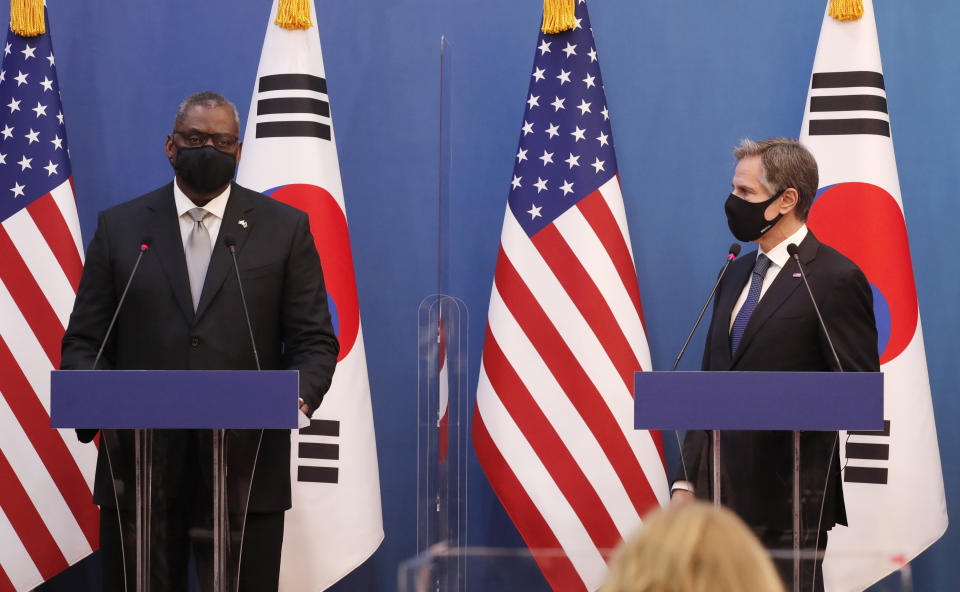 U.S. Defense Secretary Lloyd Austin, left, speaks as U.S. Secretary of State Antony Blinken, right, listens during a joint press conference with South Korean Foreign Minister Chung Eui-yong, and South Korean Defense Minister Suh Wook, at the Foreign Ministry in Seoul, South Korea, Thursday, March 18, 2021. (AP Photo/Lee Jin-man, Pool)