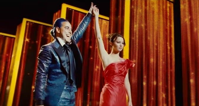 Katniss with Caesar Flickerman in "The Hunger Games"