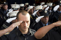 <p>New York City firefighters with Ladder 10 Engine 10 firehouse salute during a moment of silence, Monday, Sept. 11, 2017, at the World Trade Center in New York. Thousands of 9/11 victims’ relatives, survivors, rescuers and others gathered Monday at the World Trade Center to remember the deadliest terror attack on American soil. During the attacks of Sept. 11, 2001, 343 firefighters were killed. (AP Photo/Mark Lennihan) </p>