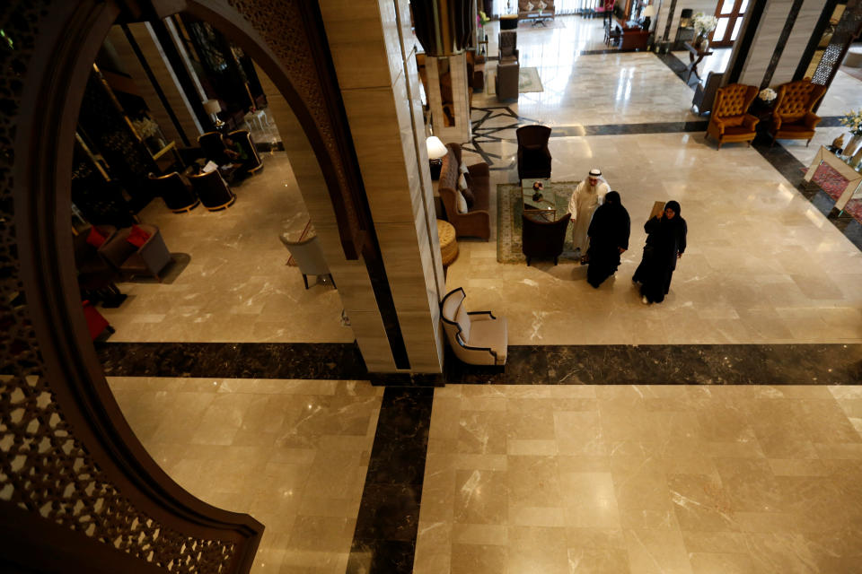 Muslims visitors walk in the Al Meroz hotel in Bangkok
