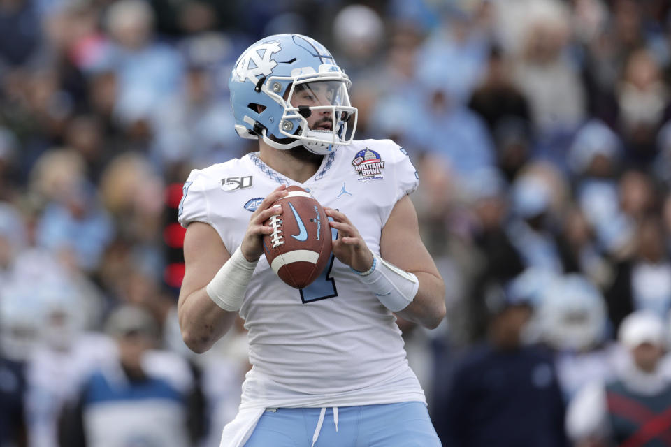 North Carolina quarterback Sam Howell looks to pass against Temple during the first half of the Military Bowl NCAA college football game, Friday, Dec. 27, 2019, in Annapolis, Md. (AP Photo/Julio Cortez)