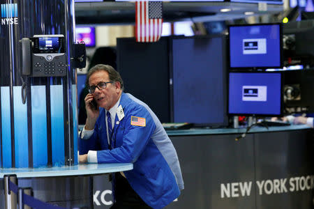 A trader works on the floor of the New York Stock Exchange, (NYSE) in New York, U.S., March 7, 2018. REUTERS/Brendan McDermid