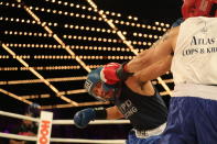 <p>Robert Cruz (red) lands a punch against Johnny Orellano (blue) in the Executive Decision Match during the NYPD Boxing Championships at the Hulu Theater at Madison Square Garden on March 15, 2018. (Gordon Donovan/Yahoo News) </p>