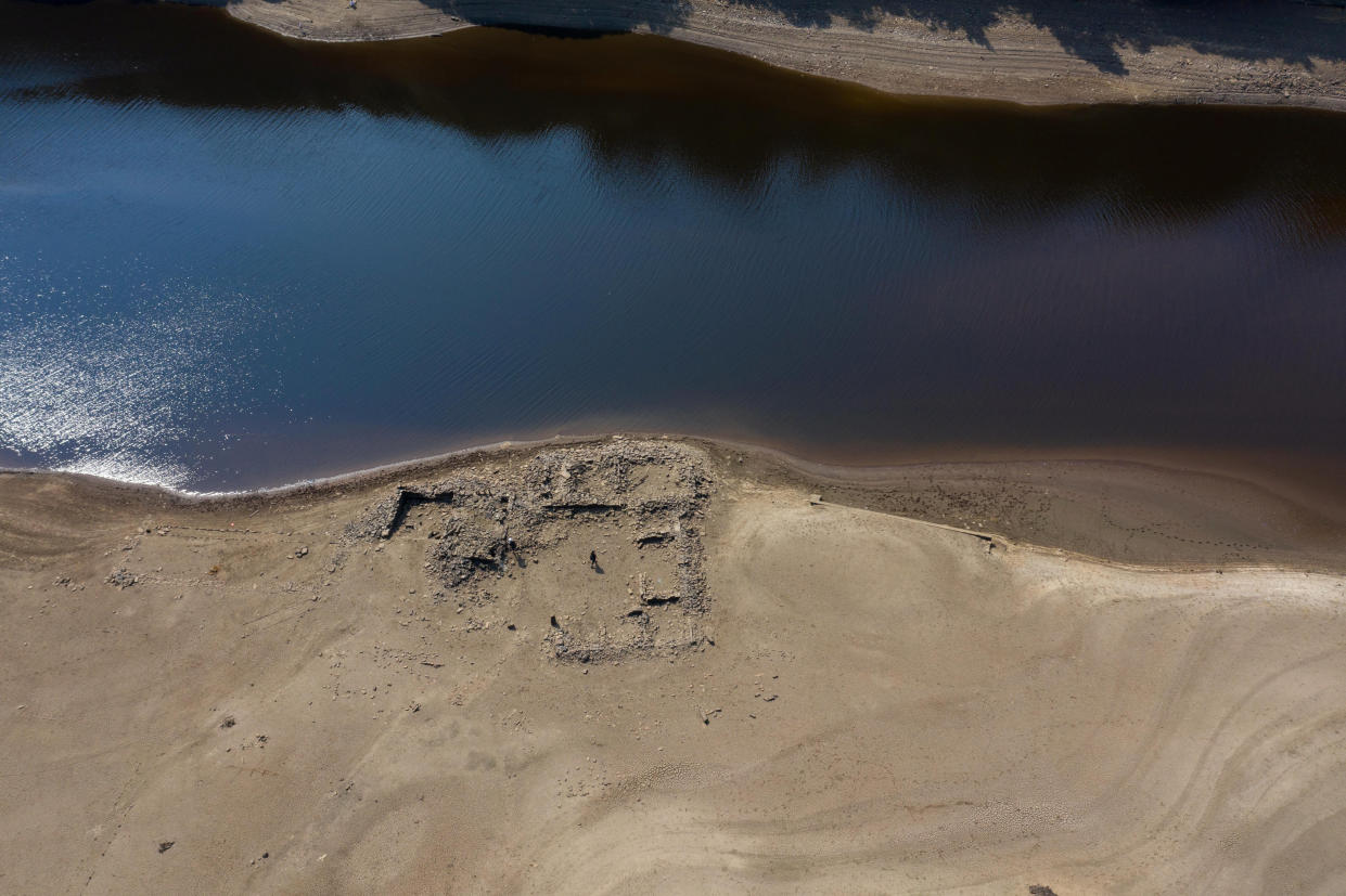 Ladybower reservoir in the Peak District does so low remains of the Ashopton can be seen. August 14 2022.