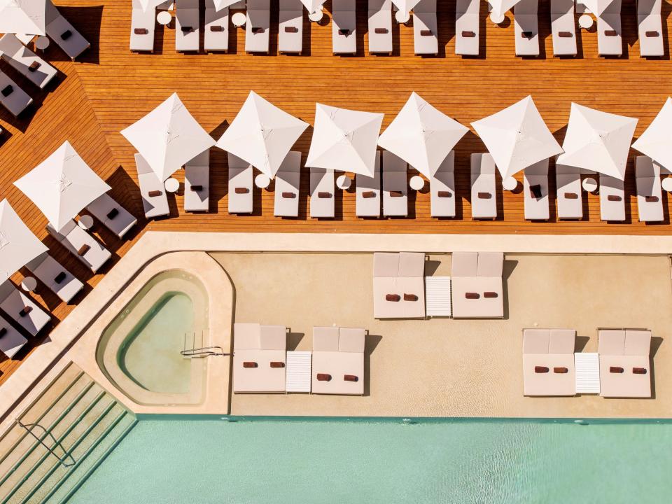 aerial view of a pool and chairs