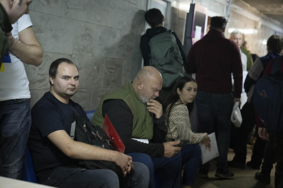 Recruits waits for their turn to pass medical examination in a city hospital in Kyiv, Ukraine, Thursday, Feb. 8, 2024. As the third year of war begins, the most sensitive and urgent challenge pressing on Ukraine is whether it can muster enough new soldiers to repel – and eventually drive out – an enemy with far more fighters at its disposal.(AP Photo/Efrem Lukatsky)