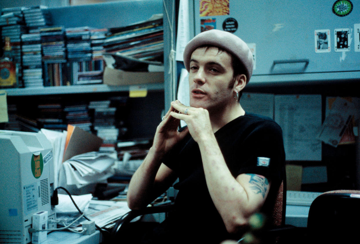 Richey Edwards of the Manic Street Preachers is interviewed in the offices of the NME, London, 1992. (Photo by Martyn Goodacre/Getty Images)