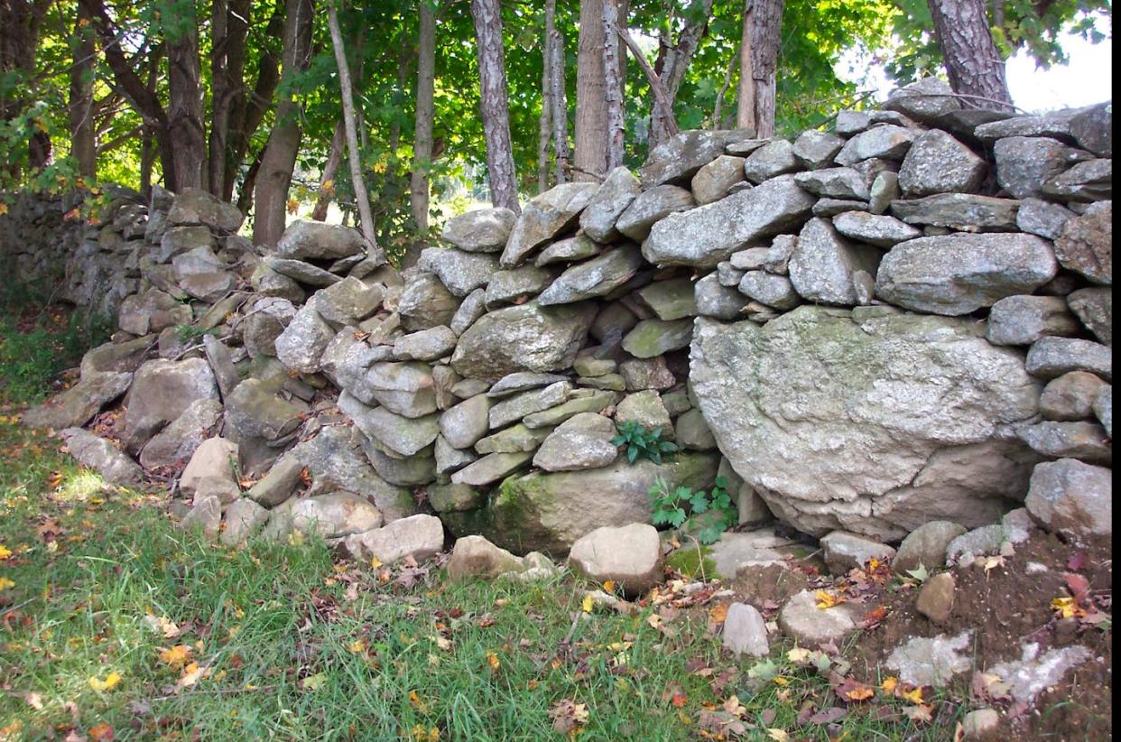 A typical New England stone wall in Hebron, Conn. Robert M. Thorson, <a href="http://creativecommons.org/licenses/by-nd/4.0/" rel="nofollow noopener" target="_blank" data-ylk="slk:CC BY-ND;elm:context_link;itc:0;sec:content-canvas" class="link ">CC BY-ND</a>