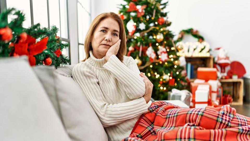 Woman sitting and feeling wave of holiday sadness How to Forgive Someone