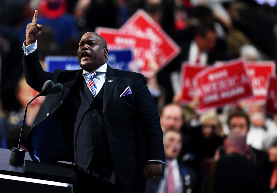  Pastor Mark Burns, co-founder and CEO of The NOW Television Network, gestures as he delivers a speech on the fourth day of the Republican National Convention on July 21, 2016 at the Quicken Loans Arena in Cleveland, Ohio. (File/Jeff J Mitchell/Getty Images)