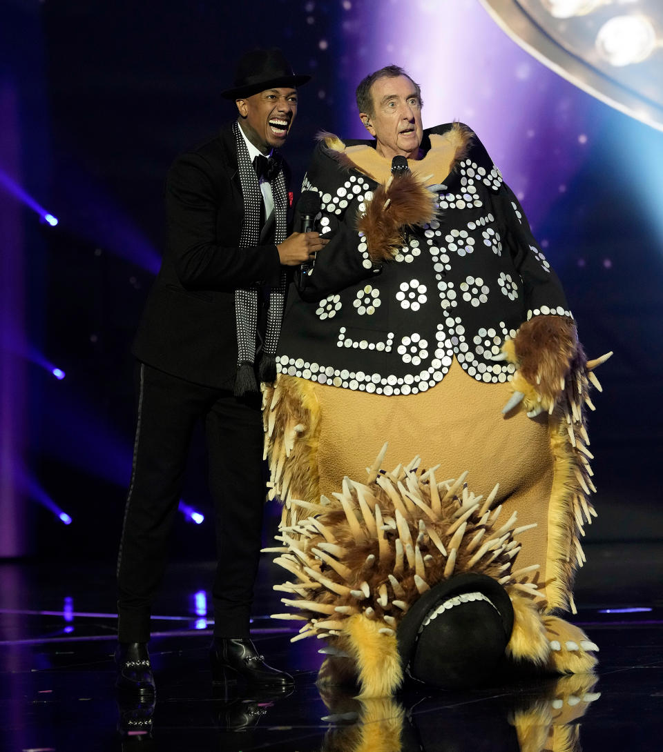 THE MASKED SINGER. L-R: Nick Cannon and Eric Idle in the season 8 premiere of THE MASKED SINGER airing Wednesday, Oct. 21 (8:00-9:00 PM ET/PT) on FOX. (Photo by FOX via Getty Images)