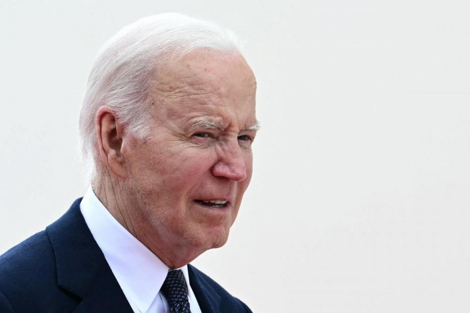 PHOTO: President Joe Biden looks on at the International commemorative ceremony at Omaha Beach marking the 80th anniversary of the World War II 'D-Day' Allied landings in Normandy, France, on June 6, 2024. (Miguel Medina/AFP via Getty Images)