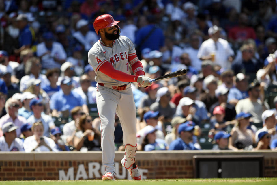 Los Angeles Angels' Jo Adell (7) watches his solo home run during the fifth inning of a baseball game against the Chicago Cubs, Saturday, July 6, 2024, in Chicago. (AP Photo/Paul Beaty)