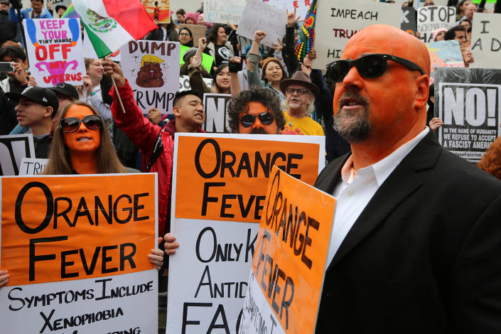 <p>Demonstrators painted orange gather at a “Not My President’s Day” rally in Los Angeles, Feb. 20, 2017. (Photo: David McNew/Reuters) </p>