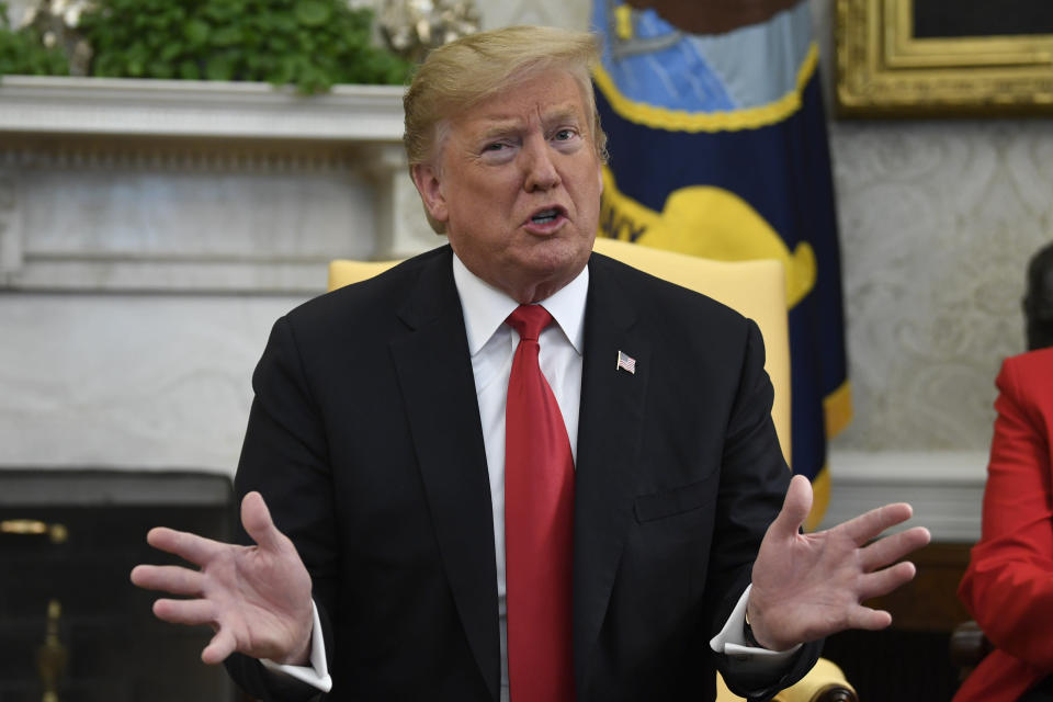 President Trump speaks to reporters in the Oval Office on Wednesday. (AP Photo/Susan Walsh)