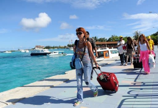 The Maldives is known as a "paradise" holiday destination that draws hundreds of thousands of travellers and honeymooners each year. Visitors' contact with the local population is deliberately kept at bay, however, with most foreigners simply transferring from the main international airport directly to their five-star resorts on outlying islands