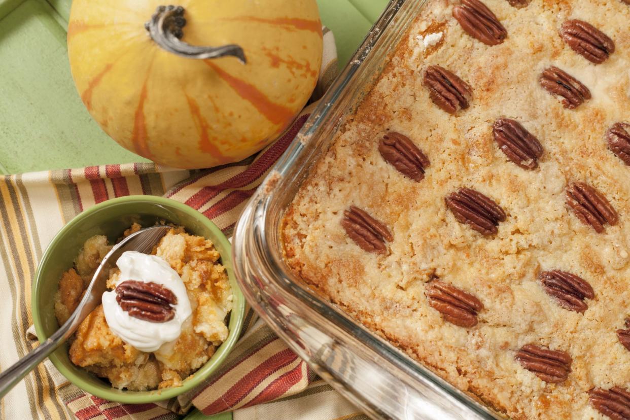 Baked pumpkin cobbler for Thanksgiving dinner.  No people in holiday baking scene.