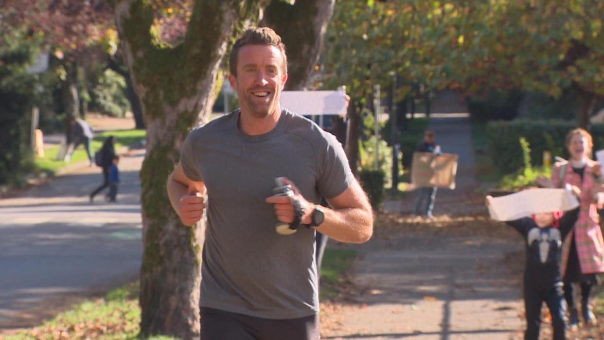 Brent Mansfield during one of his 200 laps around Lord Roberts Elementary School on Friday.  (CBC News - image credit)