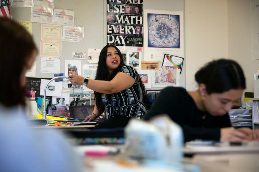 NORTHRIDGE, CALIFORNIA-FEBRUARY 6, 2020: Keiri Ramirez teaches math to 10th graders at Northridge Academy High School on February 6, 2020, in Los Angeles, California. Ramirez is a CSUN student and a student teacher at Northridge Academy High School. (Photo By Dania Maxwell / Los Angeles Times)