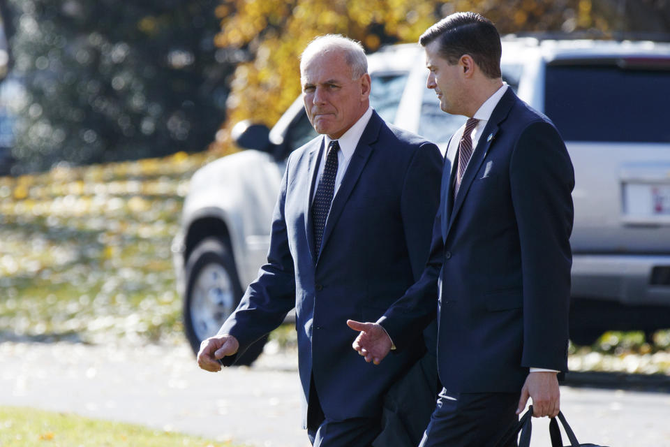 John Kelly, left, with Rob Porter