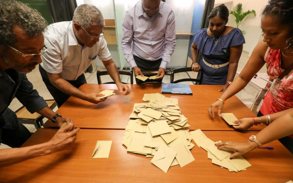 Ballots are prepared for counting at a polling station in Le Port, La Reunion on April 23 - Credit: AFP PHOTO / Richard BOUHET/AFP/Getty Images