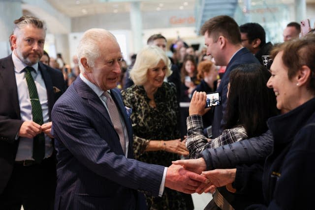 Charles and Camilla meet staff members