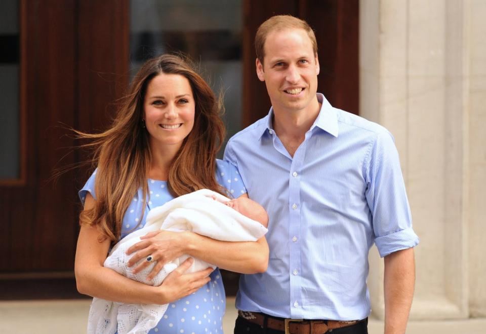 The Duke and Duchess of Cambridge leaving the Lindo Wing of St Mary’s Hospital in London, with their newborn son, Prince George of Cambridge in 2013 (Dominic Lipinski/PA) (PA Wire)