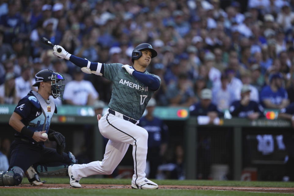 American League's Shohei Ohtani, of the Los Angeles Angels, (17) strikes out in the first inning during the MLB All-Star baseball game in Seattle, Tuesday, July 11, 2023. (AP Photo/Lindsey Wasson)