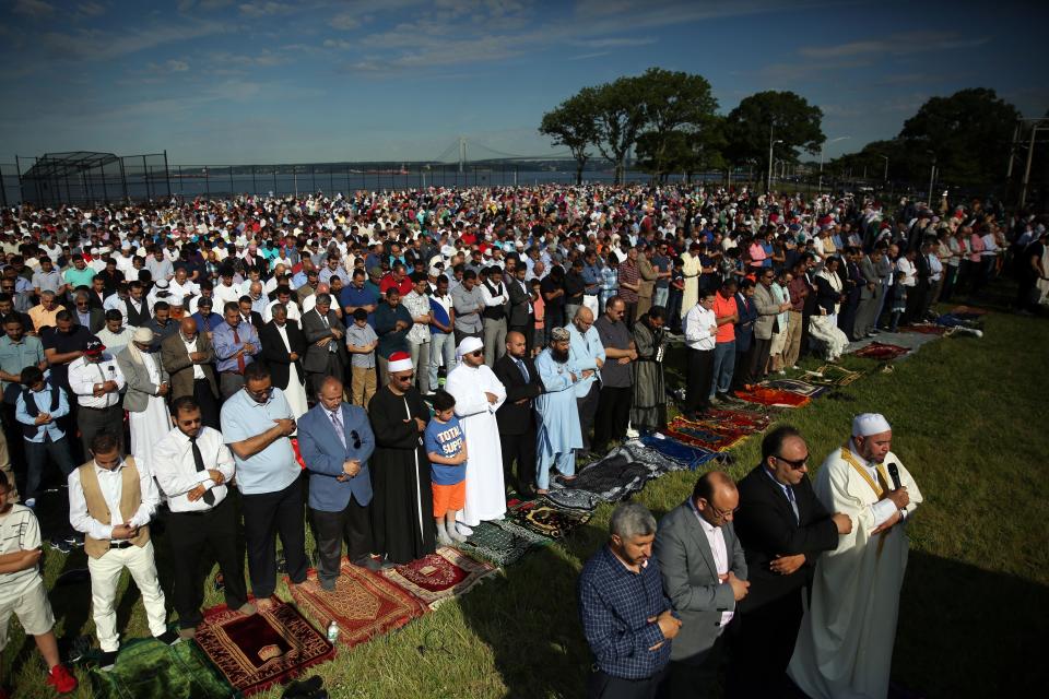 Muslims perform Eid-al-Fitr prayer in Bensonhurst Park of Brooklyn borough in New York, United States on June 25, 2017. Eid-al-Fitr is a holiday celebrated by Muslims worldwide that marks the end of Muslims' holy month of fasting Ramadan.