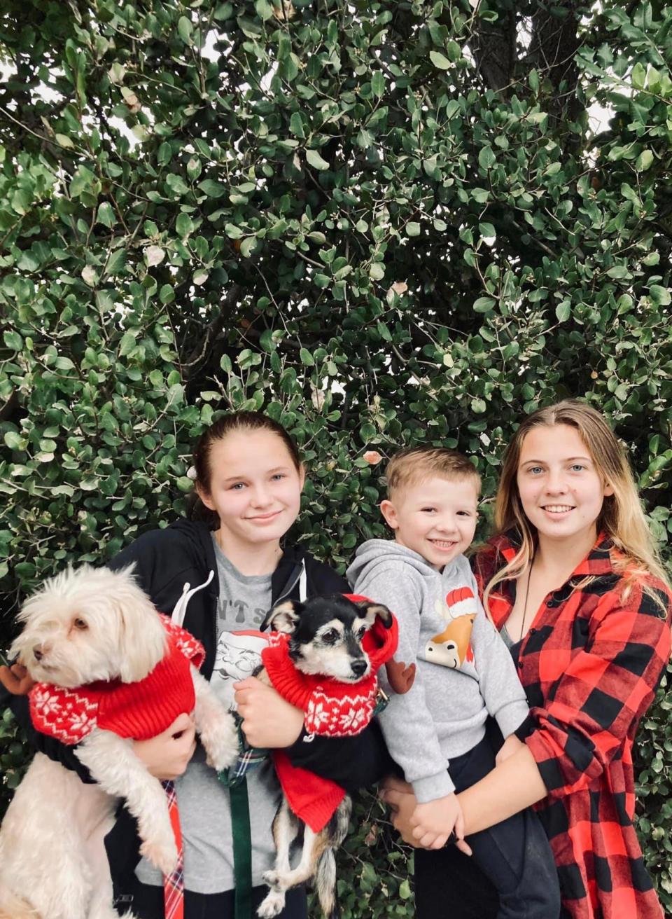 The Schmidt children, Ava, 15, Andrew “Carl," 6, and Alexis, 19, of Camarillo have moved with their parents and grandfather twice in the last year. Mom Heather Schmidt says they can afford to rent but rising costs are keeping the family from buying.