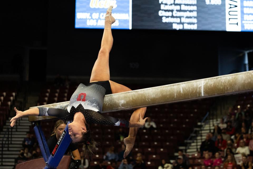 Utah Utes Jaylene Gilstrap competes on bar during the Sprouts Farmers Market Collegiate Quads at Maverik Center in West Valley on Saturday, Jan. 13, 2024. #1 Oklahoma, #2 Utah, #5 LSU, and #12 UCLA competed in the meet. | Megan Nielsen, Deseret News