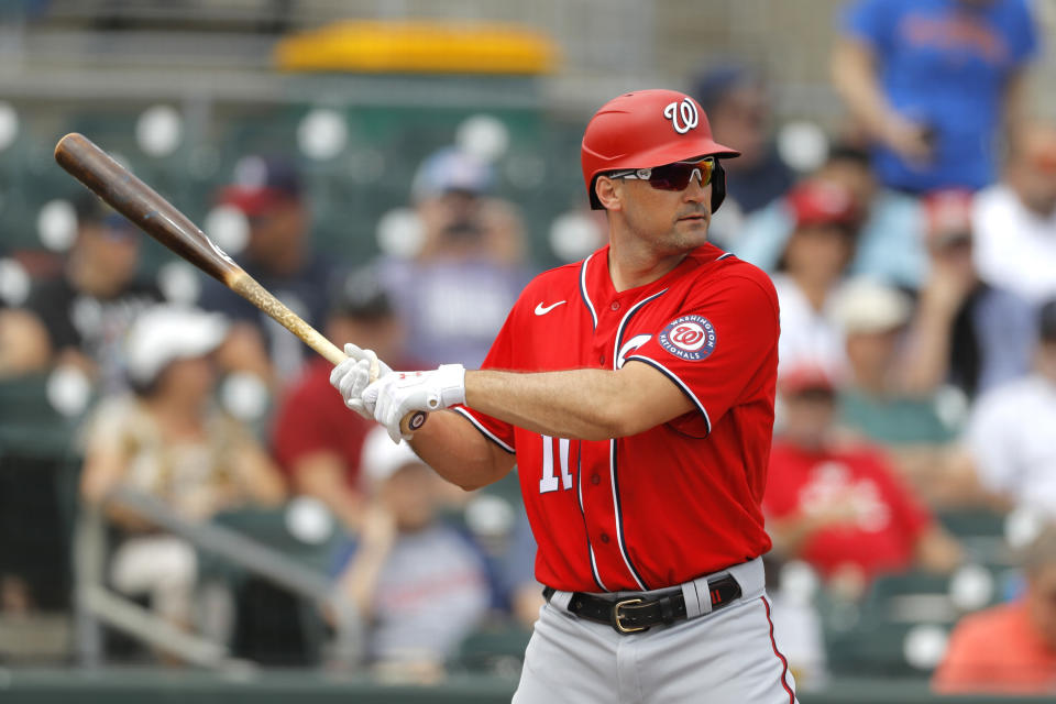 FILE - In this March 10, 2020, file photo, Washington Nationals' Ryan Zimmerman waits for a pitch from Miami Marlins pitcher Caleb Smith during the first inning of a spring training baseball game in Jupiter, Fla. With baseball on hold, Zimmerman is offering his thoughts in a diary of sorts. In the seventh installment, he discusses the possibility of the DH rule being added to the NL for 2020 -- and, perhaps, beyond. (AP Photo/Julio Cortez, File)