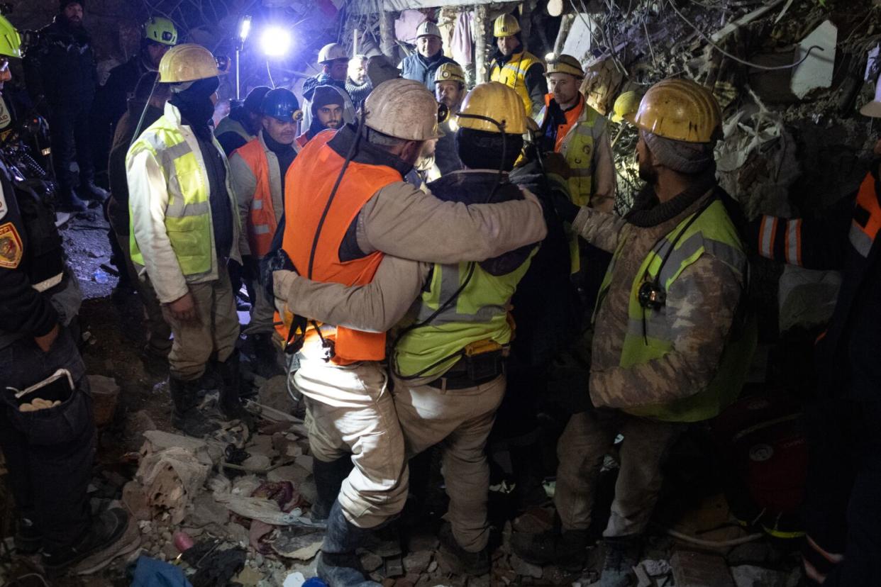 Turkish medics and search and rescue teams and USAID Los Angeles County Fire Department Urban Search and Rescue