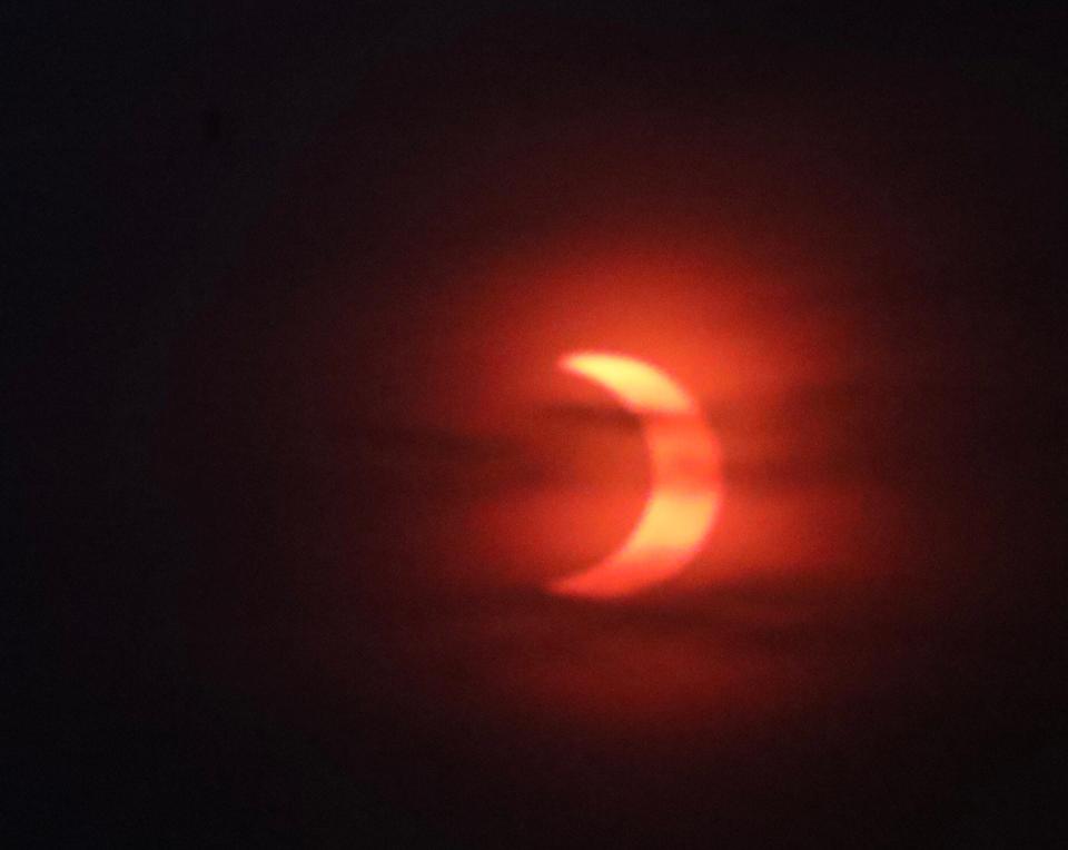 The view of a partial solar eclipse from Hamlin Beach State Park on June 10, 2021.