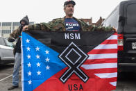 <p>A member of a group called the National Socialist Movement participates in a “White Lives Matter” rally in Shelbyville, Tenn., Oct. 28, 2017. (Photo: Stephanie Keith/Reuters) </p>