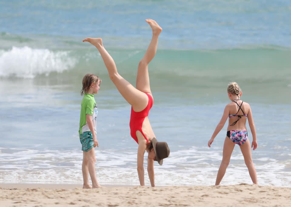 It was all fun and games with Naomi getting into the handstands. Photo: Diimex