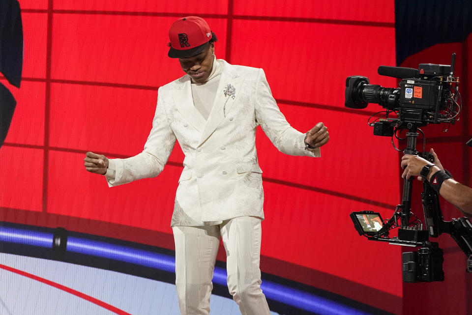 Scottie Barnes reacts after being selected fourth overall by the Toronto Raptors during the first round of the NBA basketball draft, Thursday, July 29, 2021, in New York. - Credit: AP