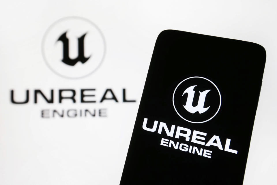 KYIV, UKRAINE - 2024/03/23: In this photo illustration, Unreal Engine (UE) logo is seen on a smartphone and a pc screen. (Photo Illustration by Pavlo Gonchar/SOPA Images/LightRocket via Getty Images)